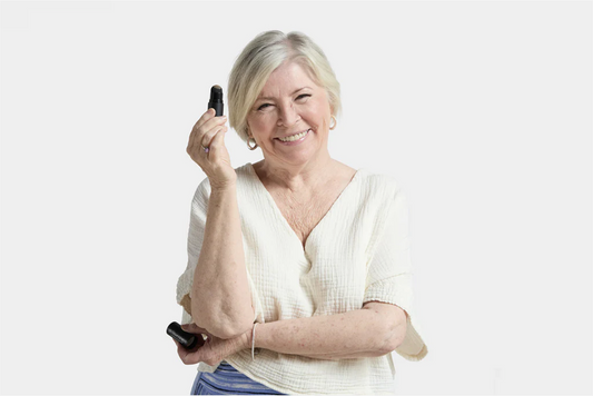 Woman holding Bold Brow Blueprint arch fille