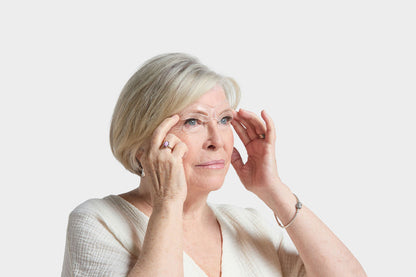 Woman adjusting the brow stencil on her face