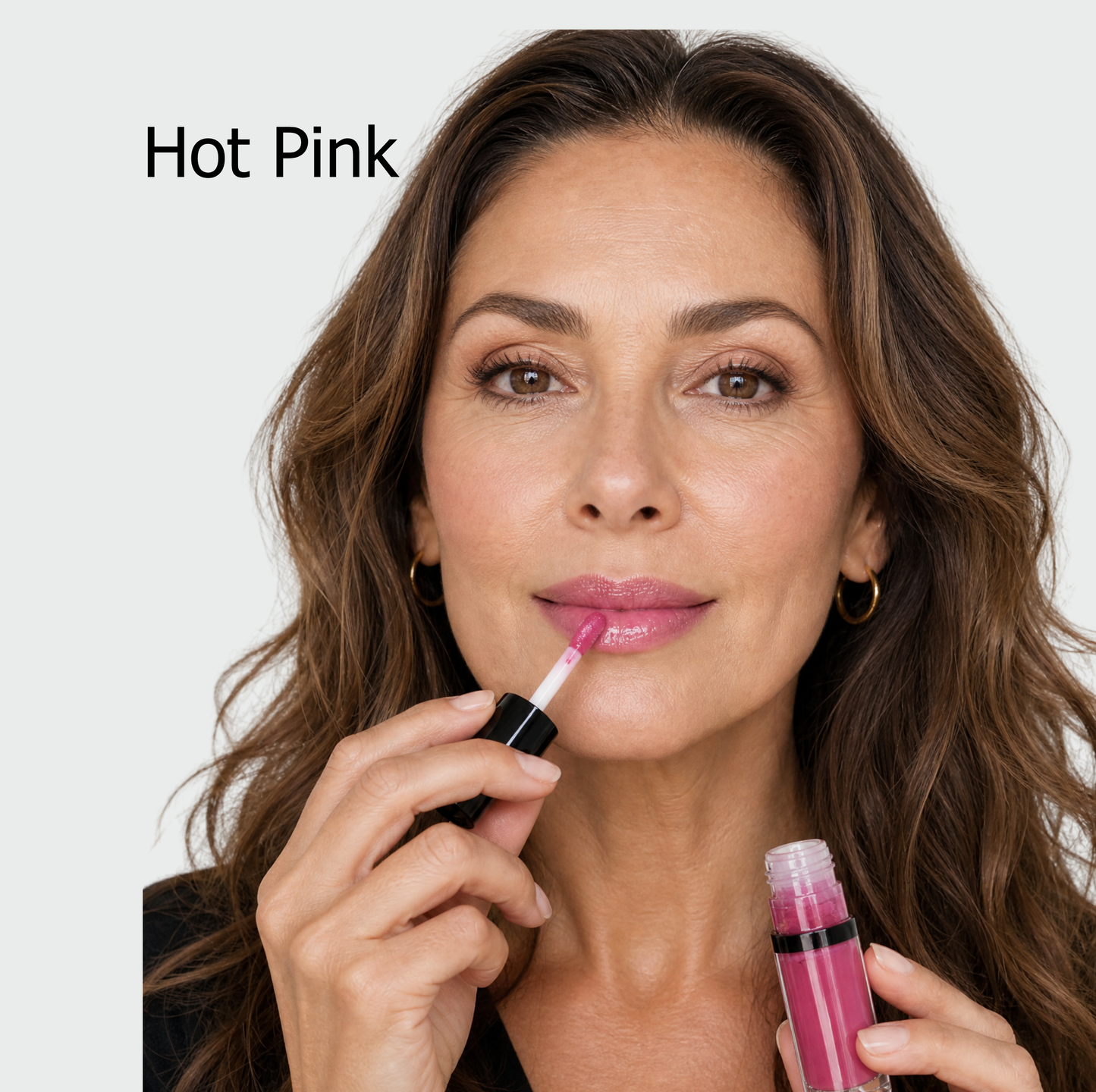 Jenn of Arch lip oil in a clear tube showing a glossy, nourishing lip treatment with a hint of color and smooth applicator.