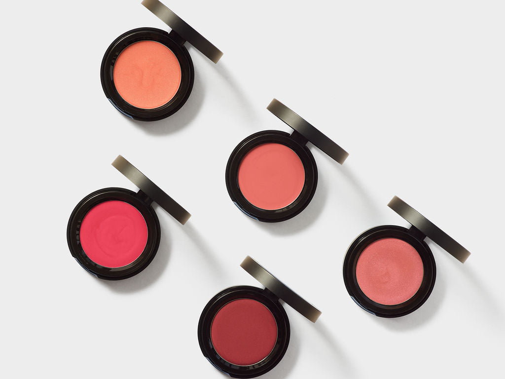 Jenn of Arch cream blush and lip tint in a sleek jar, showcasing a rich, creamy pink shade for cheeks and lips.