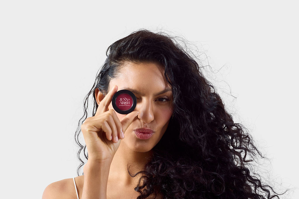 Jenn of Arch cream blush cheek and lip tint with a smooth, blendable formula in a sleek tube, perfect for natural color and subtle glow.