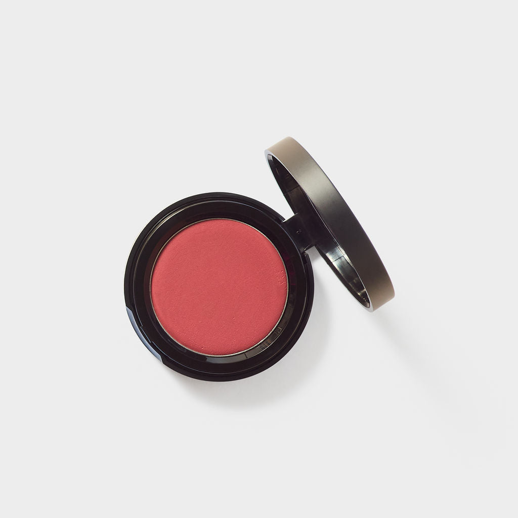 Jenn of Arch Cream Cheek and Lip Tint blush in a compact, showing its smooth, natural-colored formula for cheeks and lips.