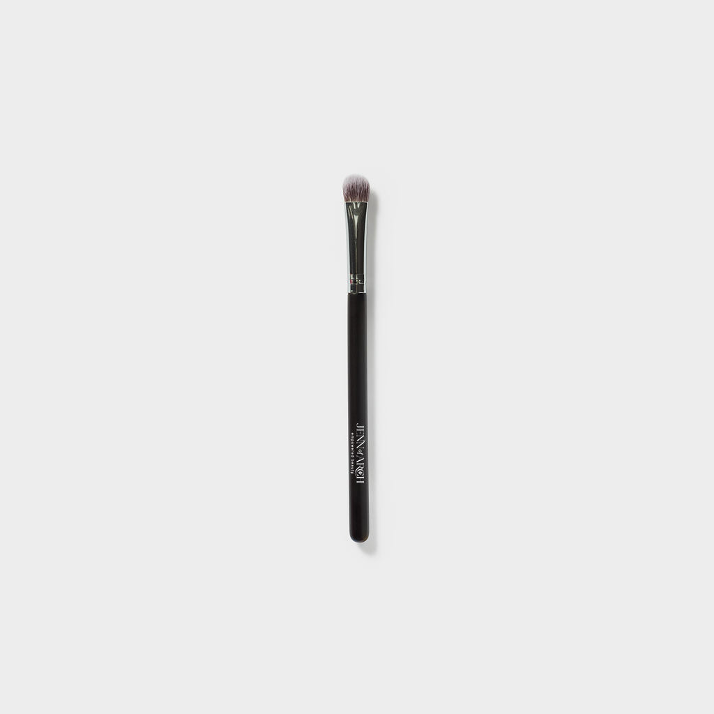 Jenn of Arch Oval Shadow Brush with soft bristles for precise eyeshadow application and blending.