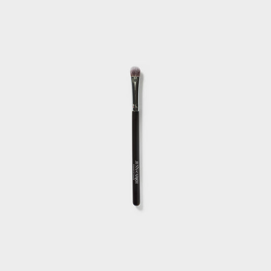 Jenn of Arch Oval Shadow Brush with soft bristles for precise eyeshadow application and blending.