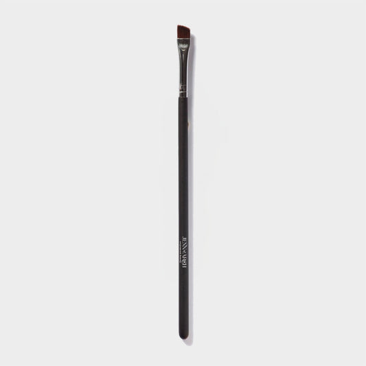 Jenn of Arch angled liner brush with sleek handle and fine bristles for precise eyeliner application or eyebrow fill