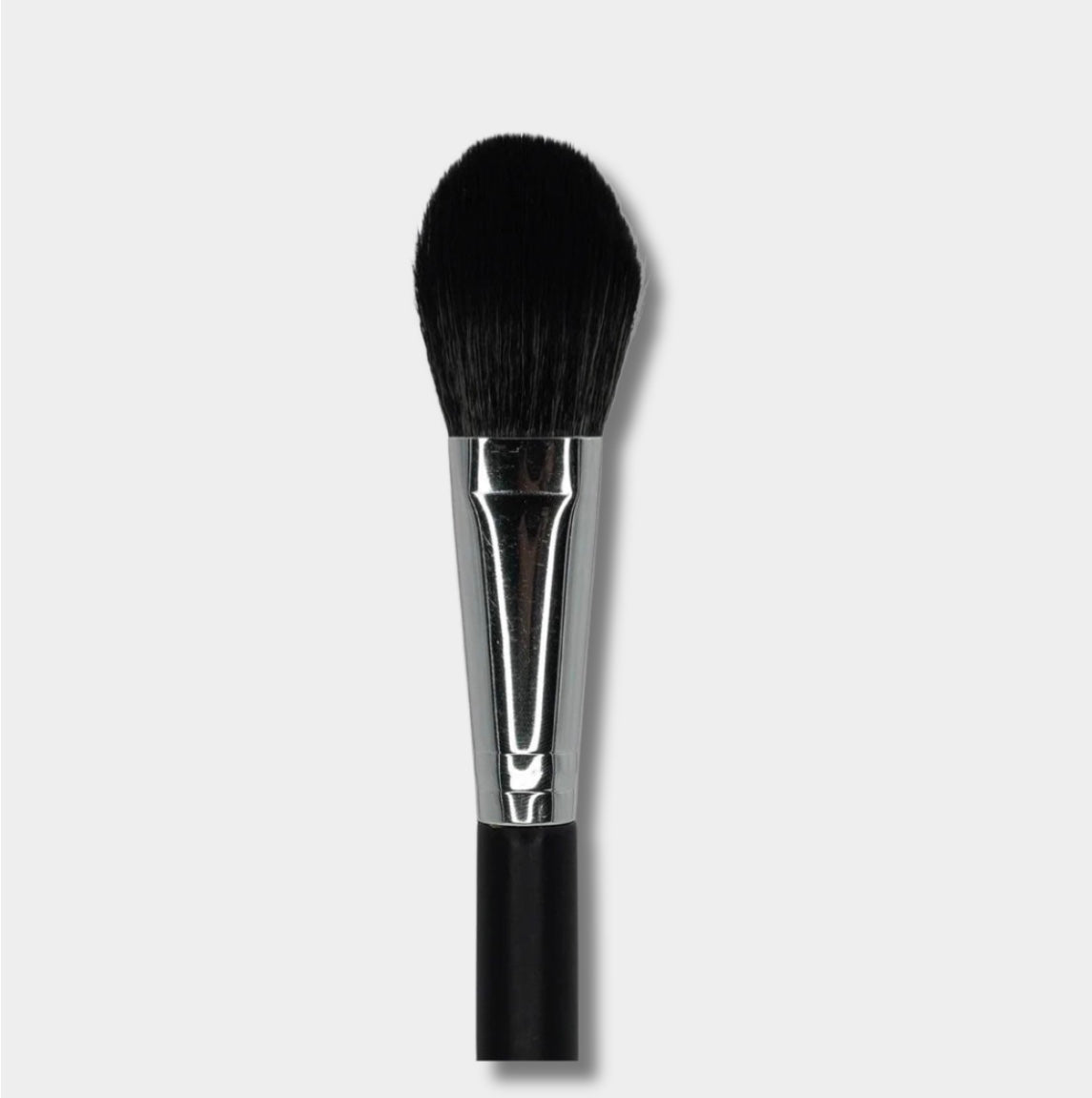 Close up of Jenn of Arch Pro Chisel Blush Brush with tapered bristles for precise application of blush and contour makeup.