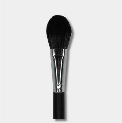 Close up of Jenn of Arch Pro Chisel Blush Brush with tapered bristles for precise application of blush and contour makeup.