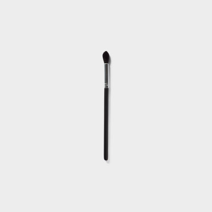 Jenn of Arch Sculpting Crease Brush with soft bristles for precise eye makeup application and crease definition.