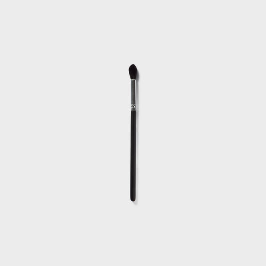 Jenn of Arch Sculpting Crease Brush with soft bristles for precise eye makeup application and crease definition.