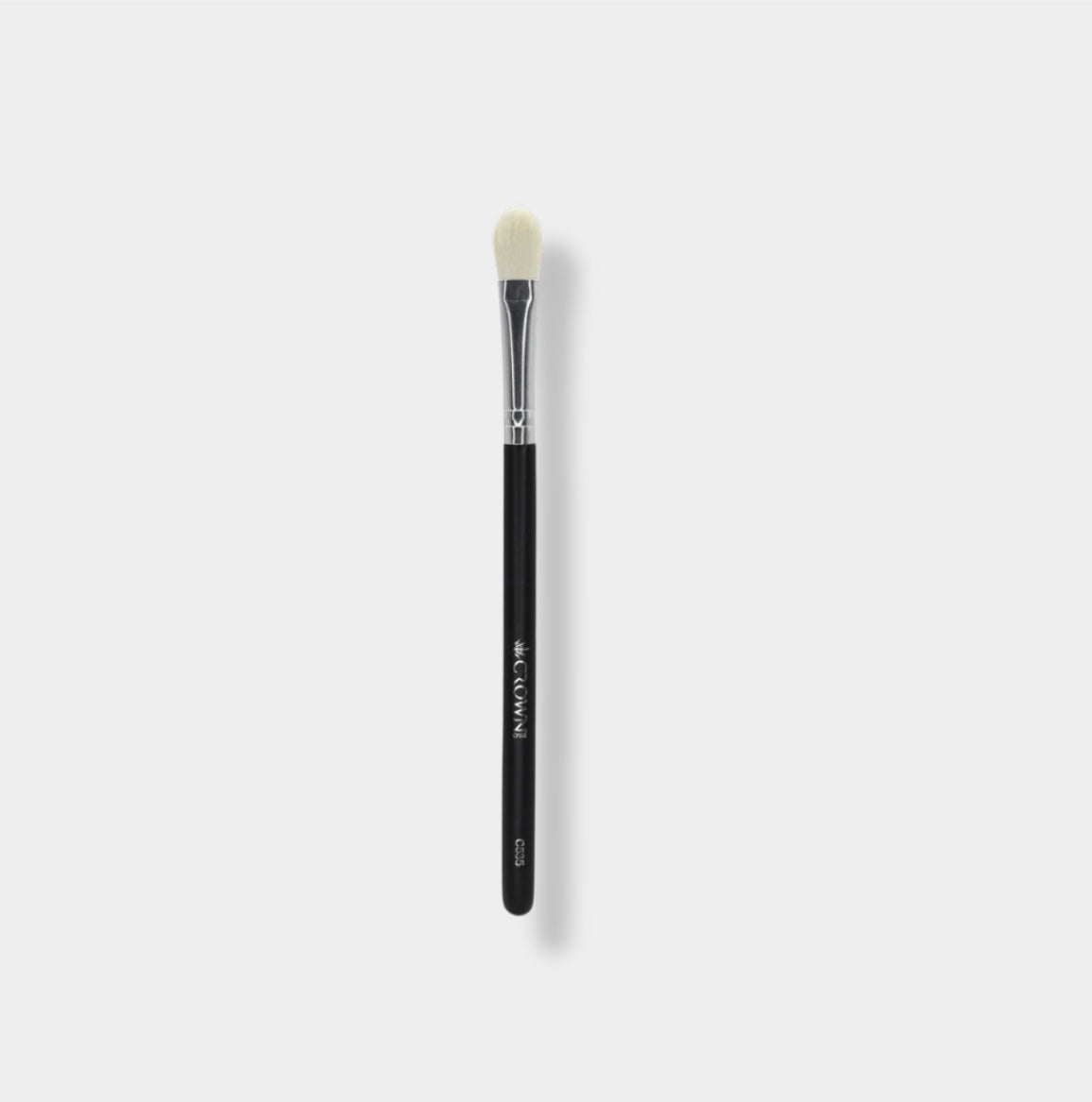 Jenn of Arch tapered base eyeshadow brush with soft bristles for precise eyeshadow application and blending.