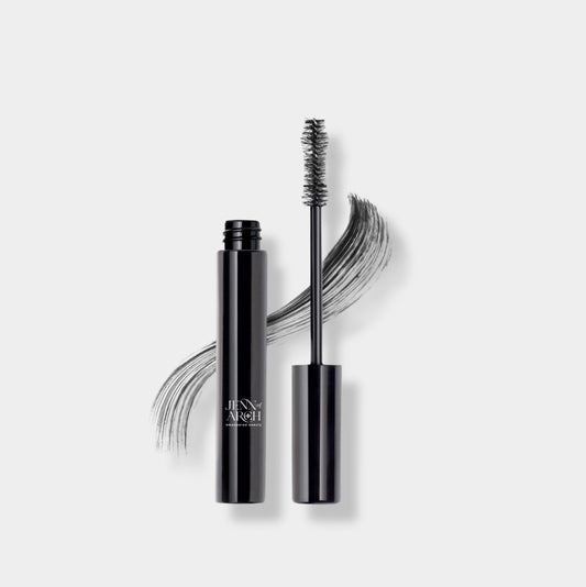 Jenn of Arch 6-in-1 clean mascara showing a sleek black tube and a brush applicator with well-defined bristles.