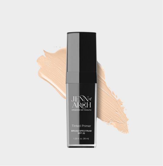 Jenn of Arch Tinted Love Primer in a sleek bottle, showcasing its smooth, tinted formula in light for a flawless makeup base.